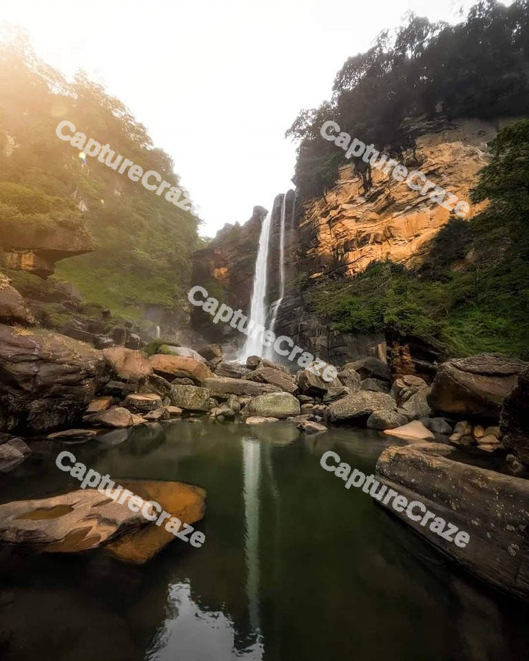 Waterfall in-between Cliff
